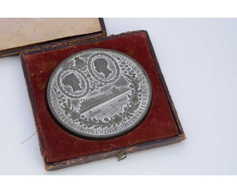 An 1851 Victoria and Albert Crystal Palace Exhibition white metal medallion,  to commemorate the 'Exhibition of industry of a