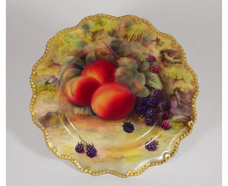 A Royal Worcester comport, decorated with fruit, signed by T Lockyer. Date code 1926. Printed marks. Height 12cm, diameter 22