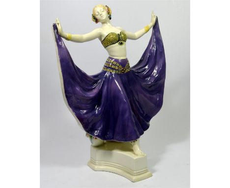 A large Goldscheider figure of an exotic dancer supported by tubs of flowers, by Albert Dominique Rosé. Model 4141 105 10. Im