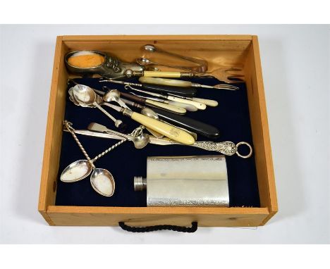 A selection of silver plated spoons, crochet hooks, a pair of sugar tongs and a English pewter hip flask. (20+)