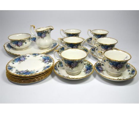 A Royal Albert 'Moonlight Rose, part tea service, 6 cups and saucers, 6 side plates, 1 tea plate, 1 milk jug and 1 sugar bowl