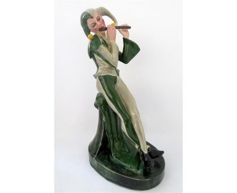 A Goldscheider glazed figure of a jester, designed by J. Kostial, circa 1924. Model 5102. Impressed and printed marks. Height