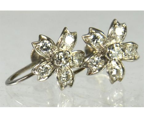 A pair of floral diamond earrings, five petals set with modern cut diamonds, centre diamond each approx 0.20ct and stamped 9c