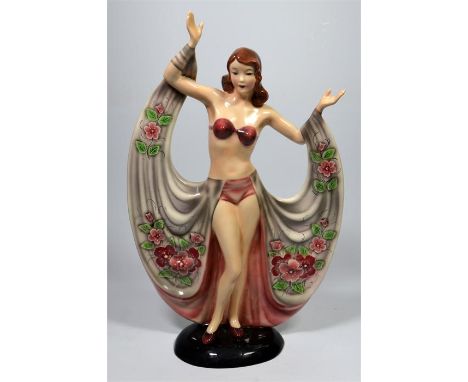 A large Austrian polychrome figure of a female dancer in the style of Goldscheider. Circa 1930. Impressed marks 166. Height 3