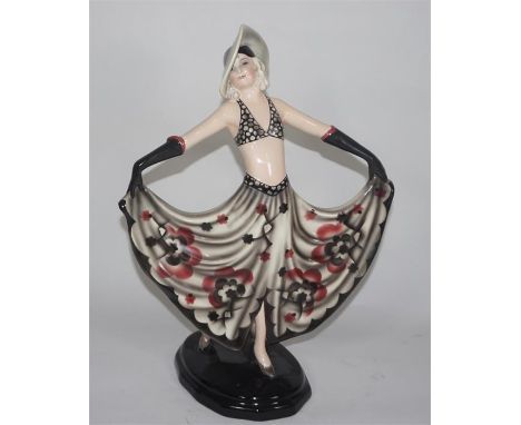 A Goldscheider figure of a Lady displaying her skirt. Designed by Steven Dakon. Model 6757. Impressed and printed marks. Heig