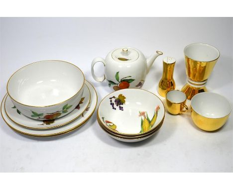 A Royal Worcester 'Evesham Vale', part dinner service and part tea service, comprising plates, dessert bowls, soup bowls, veg