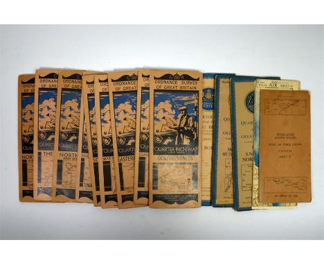 A leather box, stamped E.B. Canning, containing 14 Ordnance Survey 1/4" cloth maps of Great Britain, circa 1940.