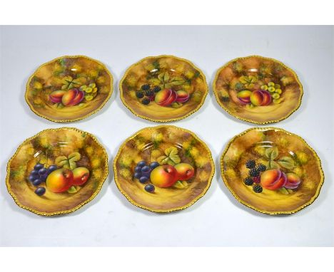A set of Royal Worcester plates painted with a still life of fruit, signed J. Smith. Printed marks. Diameter 17cm. (6)