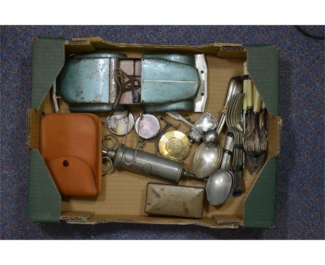 A tray lot of metalware, including a silver salt spoon, a surgical syringe, a clockwork tin plate car and a pre war Wilkinson