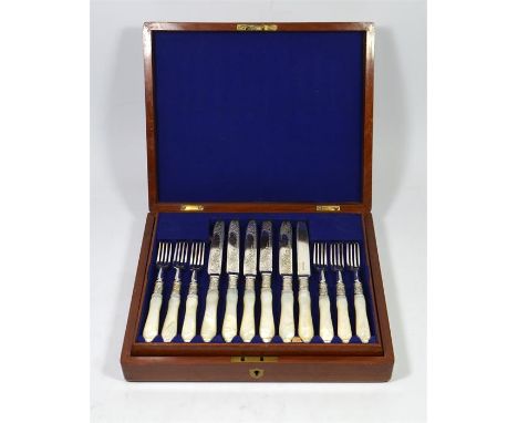 A set of twelve mother of pearl handled, silver collared fruit knives, William Hutton and Sons, Sheffield 1920 in a wooden ca