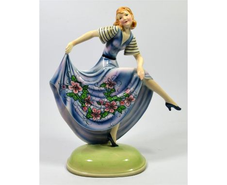 A large Goldscheider figure of a stylish dancer on tiptoe, designed by Stefan Dakon. Model 6704 2. Impressed and printed mark