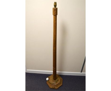 A Robert Thompson of Kilburn Mouseman standard lamp with a octagonal tapered column and base. Height 138cm.