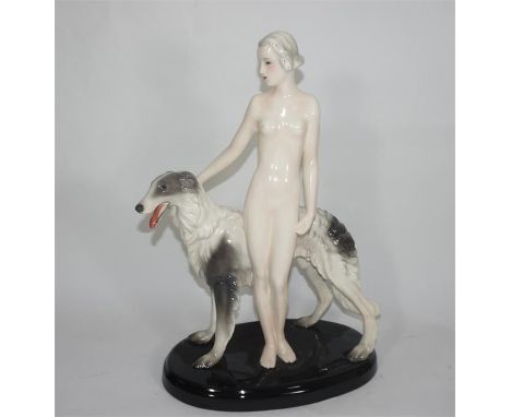 A large Goldscheider figure of a nude woman with Borzoi designed by Josef Lorenzl. Model 7463.Impressed and printed marks. he
