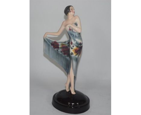 A Goldscheider figure of a Flamenco dancer. Designed by Josef Lorenzl . Model 6062. Impressed and printed marks. Height 30cm