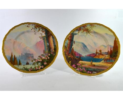 A pair of Royal Worcester plates, Italian lakes scenes, signed H. George and date code for 1930. Diameter 27cm.