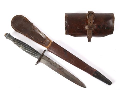 Fairbairn Sykes type Commando dagger the spear shaped blade shortened and re-ground, on ringed alloy grip with brass pommel, 