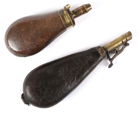 A Sykes powder flask and a leather shot flask. 