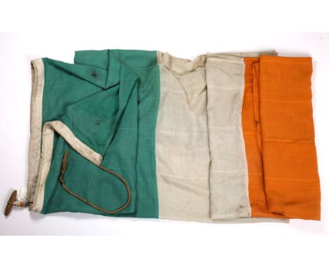 A large linen Irish Tricolour, of a scale used on Government buildings, Army barracks etc. 70" x 111" (178 x 282cm). 