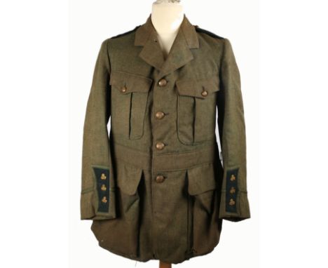 1913-16 Irish Volunteers Captain's tunic. A grey-green military tunic, the epaulettes and cuff facings in dark green, with co