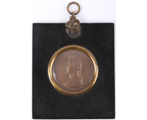 A late 18thC gilt metal circular embossed relief cameo portrait of William Pitt, head and shoulders profile, 5.5cm diameter, 