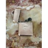 AN ANTIQUE GOLD LIGHTER, ENGLISH