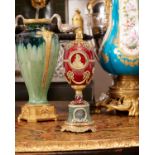 A FABERGE STYLE DIAMOND ENCRUSTED, GUILLOCHE ENAMEL AND SILVER GILT EGG