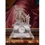 A SILVER MANTEL CLOCK DEPICTING LAOCOON AND HIS SONS