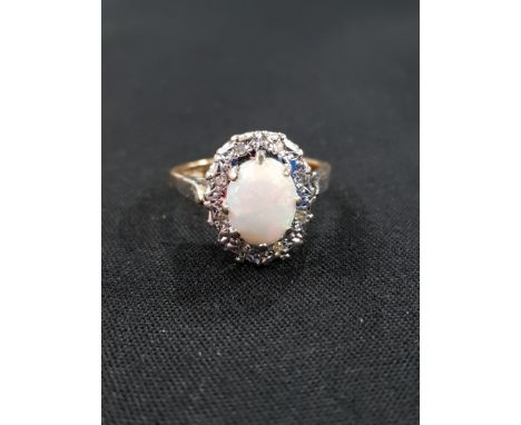 18 CARAT GOLD OPAL &amp; DIAMOND RING