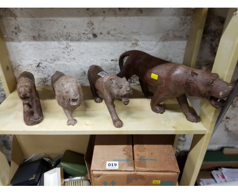 SHELF LOT OF WOODEN CARVED LIONS