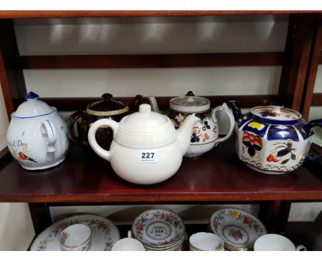 SHELF LOT OF OLD TEA POTS