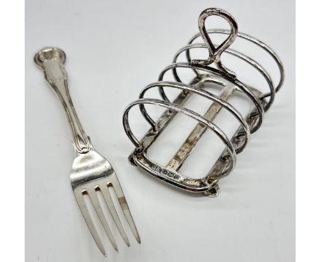 Silver toast rack, Harrison Brothers & Howson, Sheffield c1930 together with silver fork, William Eley I & William Fearn, Lon