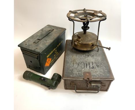 A box of collectable odds including a Primus Stove, a working bus conductors ticket machine, an empty military ammunition box