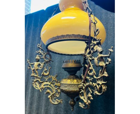Louis XV decorative brass hanging chandelier, with mustard yellow shade