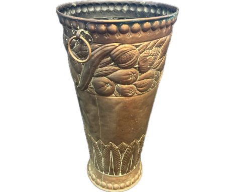 Brass raised relief stick stand.