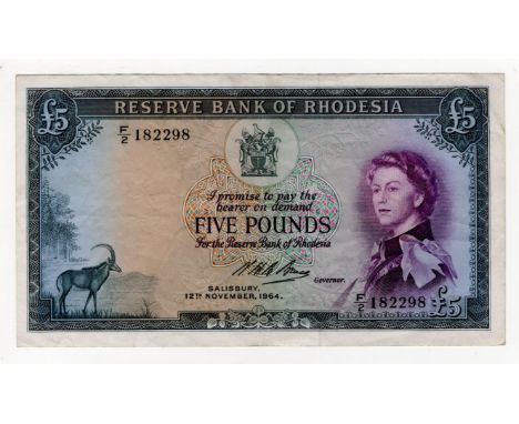 Rhodesia 5 Pounds dated 12th November 1964, portrait Queen Elizabeth II at right, signed N.H.B. Bruce, serial F/2 182298 (BNB