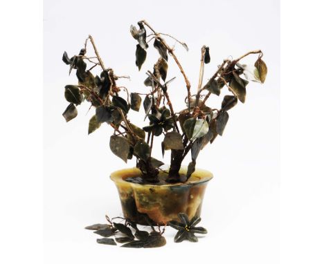 A Chinese hardstone model tree 19th Century in jade oval planter (with various loose pieces), 38cm high