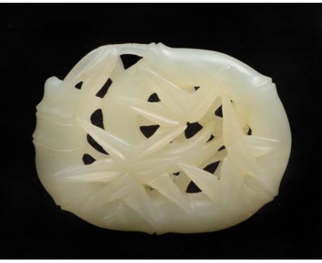 A Chinese white jade pendant 19th Century carved as entwined bamboo and foliage, 5.5cm