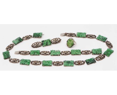 A suite of jade mounted jewellery to include a necklace, a ring, a brooch and bracelet