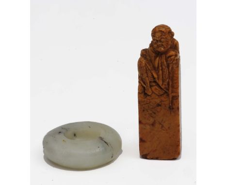 A Chinese hardstone seal 18th/19th Century the square seal mounted by a mounted by a Lohan, 9cm high and a jade brush washer,