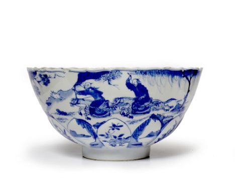 A Chinese blue and white bowl Kangxi (1662-1722) moulded as a lotus with petal edged rim decorated with equestrian figures an