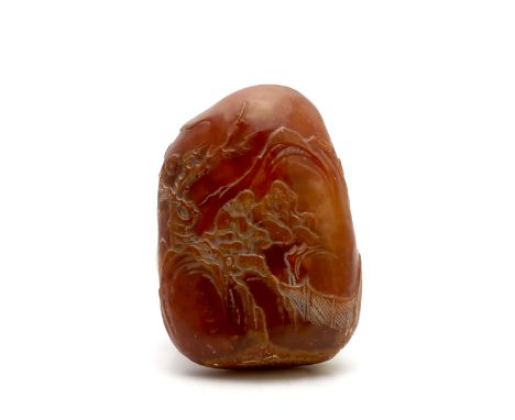 A Chinese jade reddish brown boulder 19th Century carved allover mountain landscape with two figures sitting by a river, 7cm 