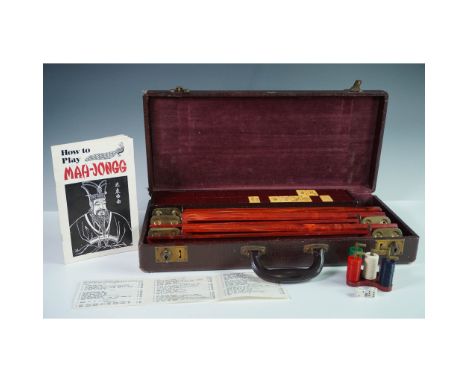 A vintage Mahjong game set housed in a textured faux crocodile case with velvet-lined interior. The set includes colorful Bak
