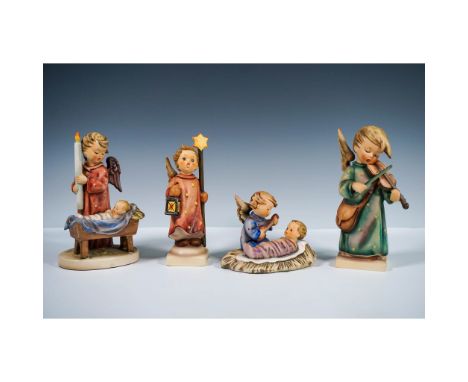 This group of four Goebel Hummel figurines features angel-themed designs produced in West Germany. The set includes: Heavenly