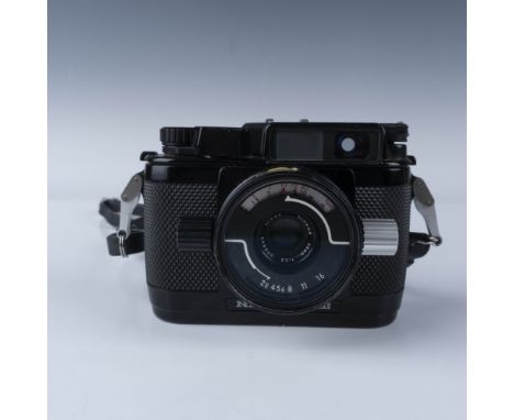 Vintage Nikon Nikonos III underwater 35mm film camera with attached Nikkor 35mm f/2.5 lens, designed specifically for underwa
