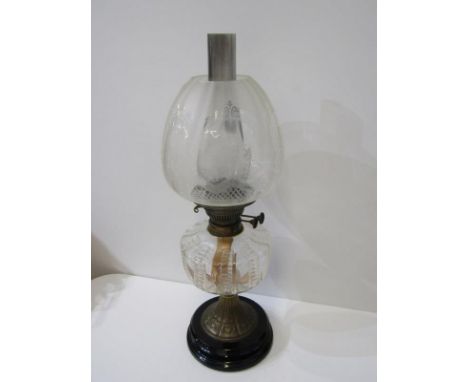EDWARDIAN OIL LAMP, decorative glass reservoir with frosted floral glass shade and embossed metal circular base 