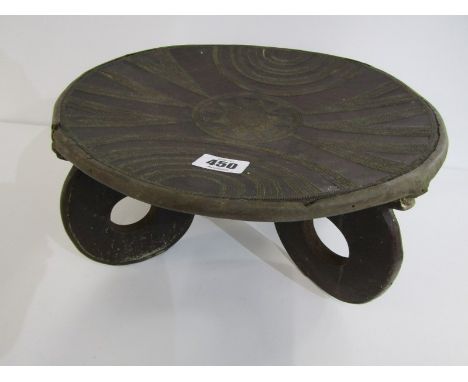 ETHNIC STOOL, a circular stool with attractive geometric decoration, 99cm diameter Lot 450: Metal rim band lifting in places 