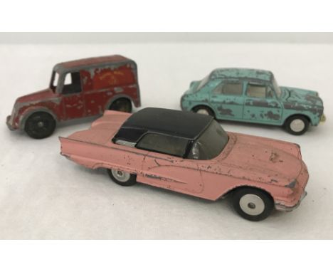 Comprising:- Corgi pink Ford Thunderbird, Tri-ang Spot-On Morris 1100, and a Charbens GR Royal Mail van (missing 1 tyre). 