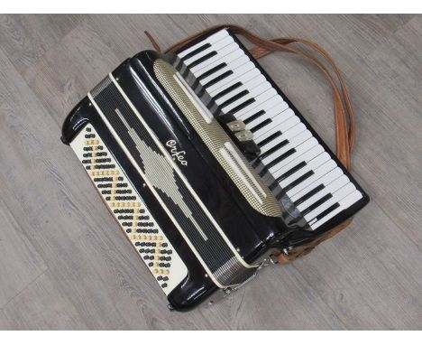 An Orfeo 120 bass piano accordion with black body, hard cased 