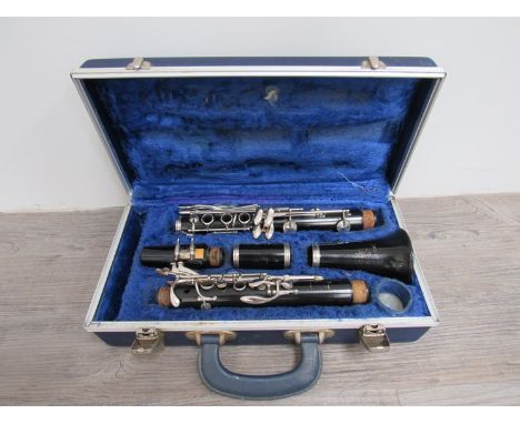 A Boosey and Hawkes Regent clarinet in Bakelite, cased