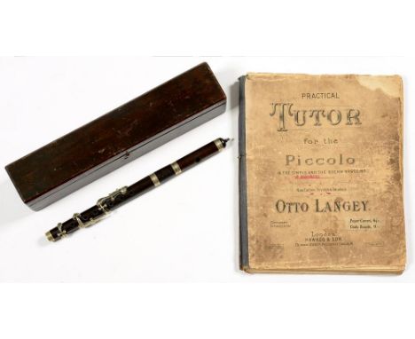 AN EARLY 20TH C GRENADILLA WOOD PICCOLO, STAMPED CROWN AND LONDON IMPROVED D [KEY], WOOD CASE, WITH NOTE OF PROVENANCE TO ALB